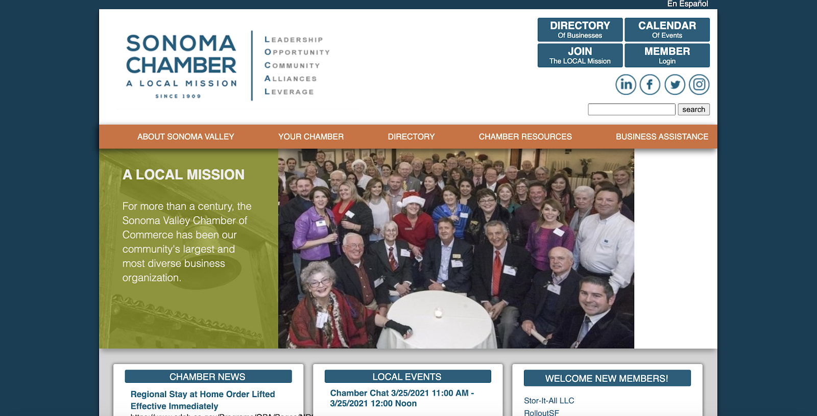 Sonoma Chamber of Commerce website displaying a mission statement next to a photo of their members at a formal party, sporting nametags.  