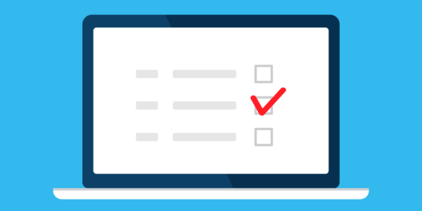 A laptop screen showing a needs assessment survey, with one checkmark among several multiple choice options.