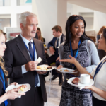 
                            Chamber of commerce members networking at an event                            