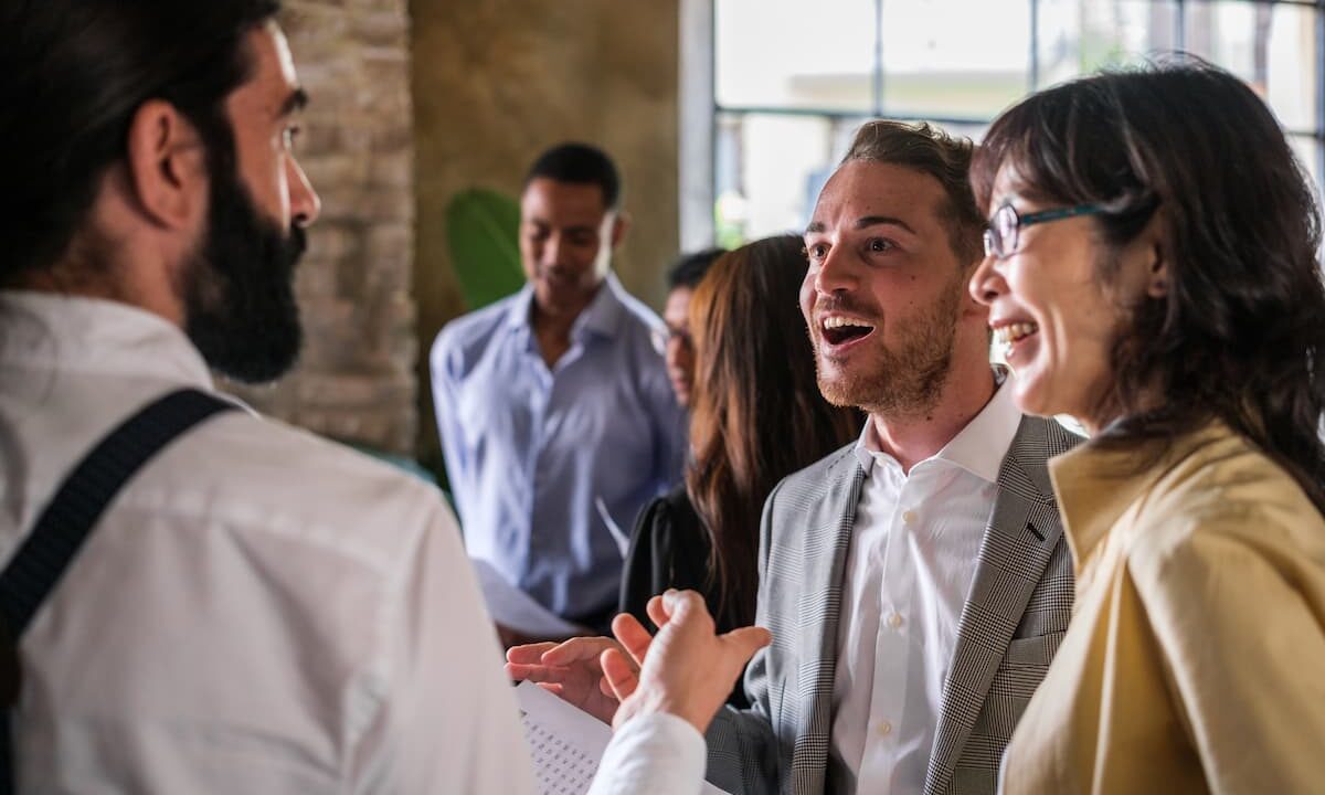 two people discussing a partnership at an association event