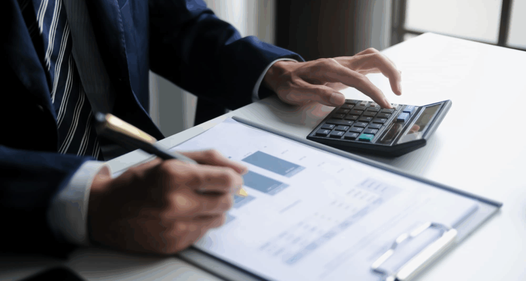 businessman reviewing a calculation in an office setting