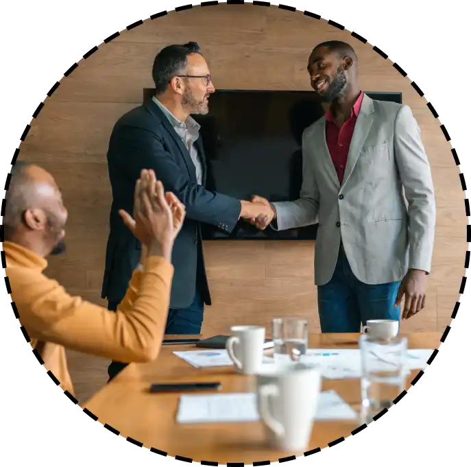 colleagues celebrate during a meeting