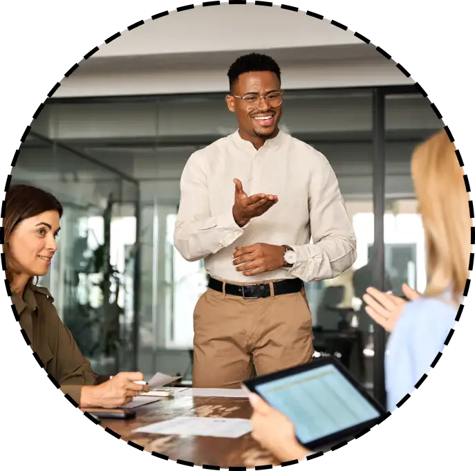 colleagues watch an office presentation