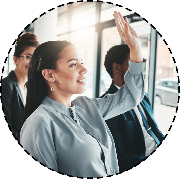 a woman raises her hand