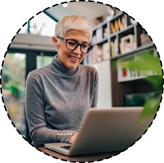 woman typing on a laptop
