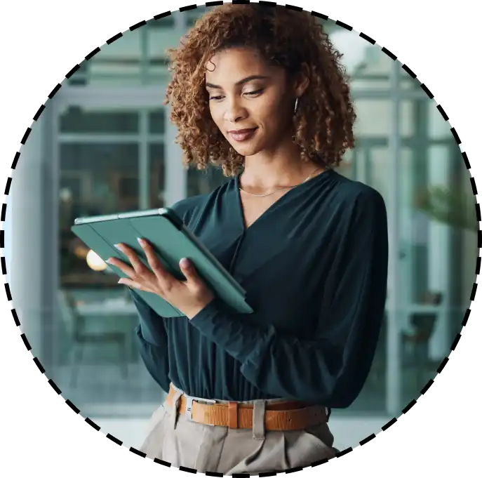 woman typing on a tablet computer
