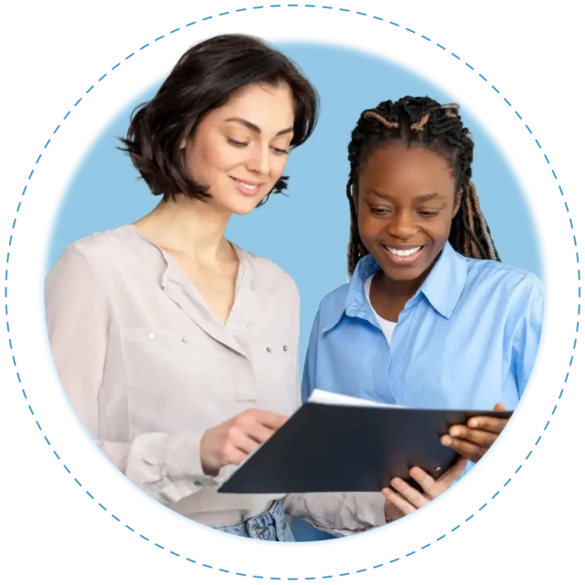 two women reviewing a report